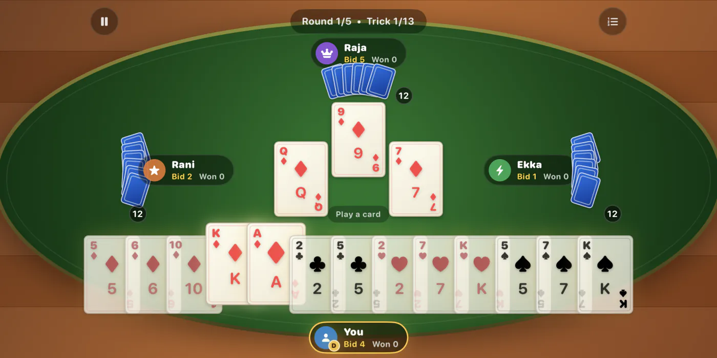 A Call Break trick against three bots on green felt, with only the cards I may legally play raised from my hand.